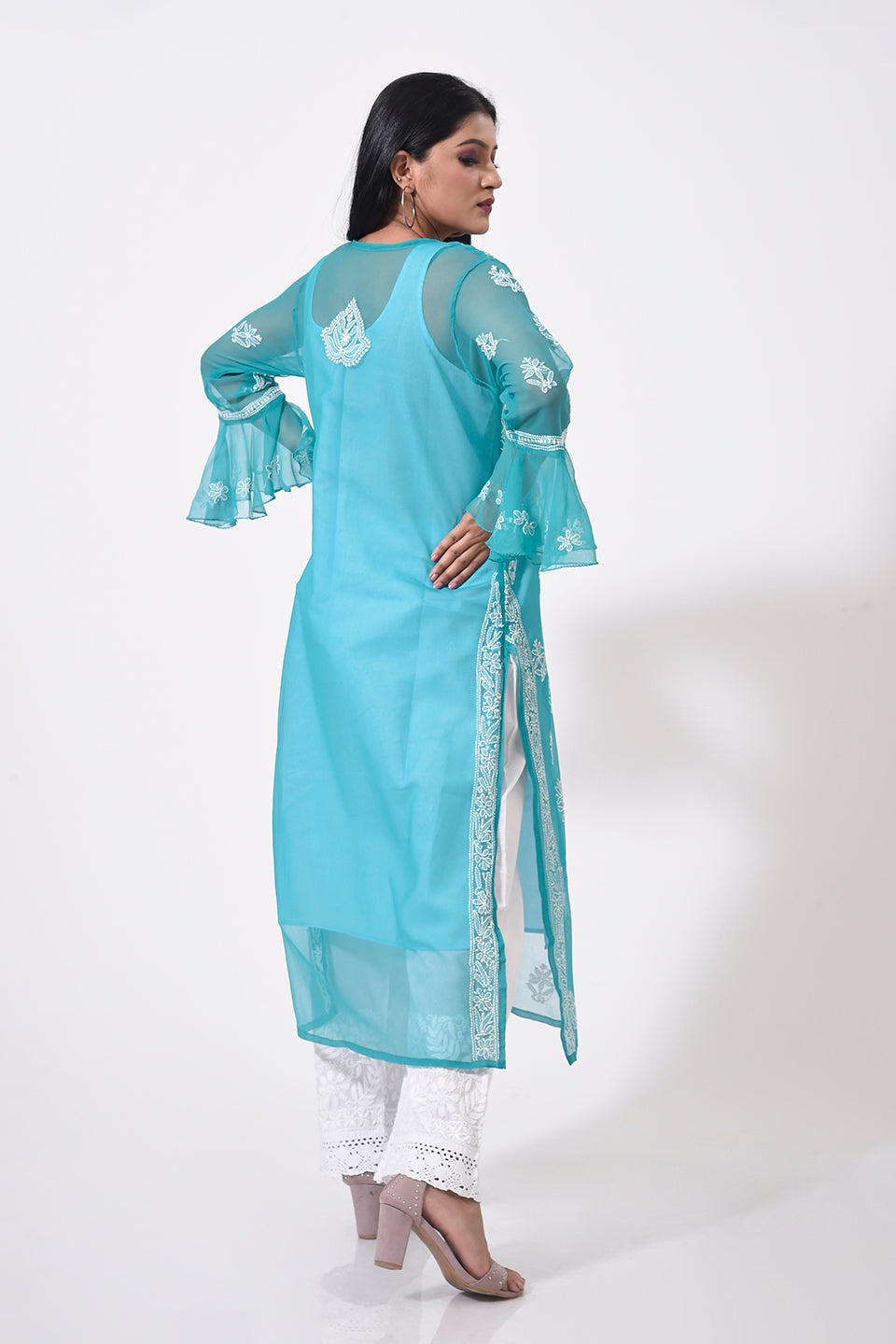Nice peacock green Hand Chikankari Semi Georgette women Kurti Lucknow Chikan Emporium.