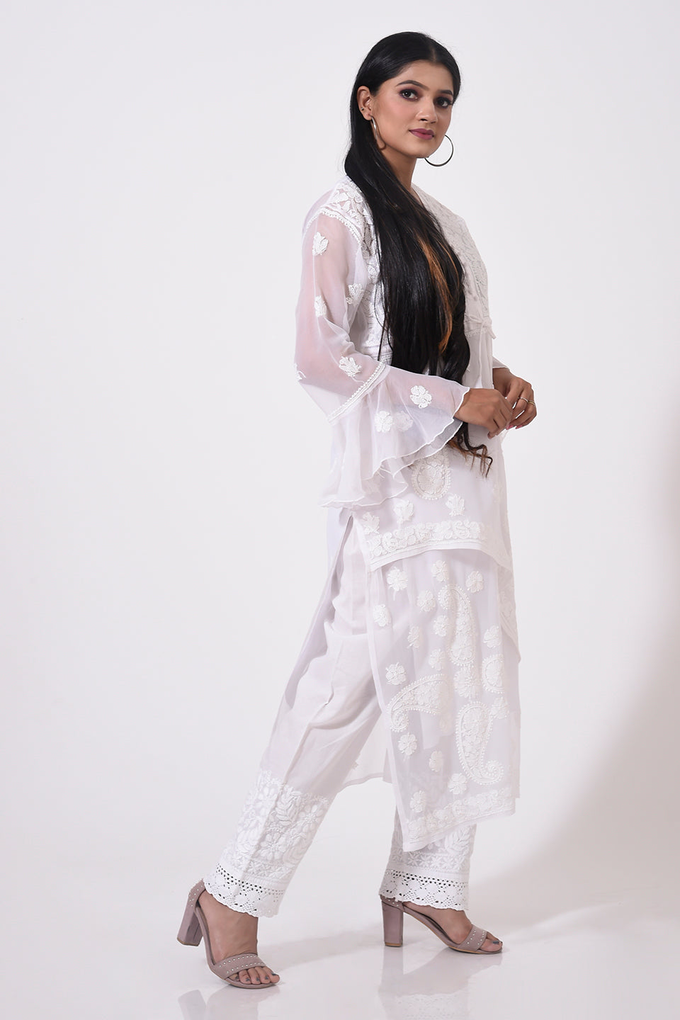 Nice white women Kurti Hand Chikankari Semi Georgette Lucknow Chikan Emporium.