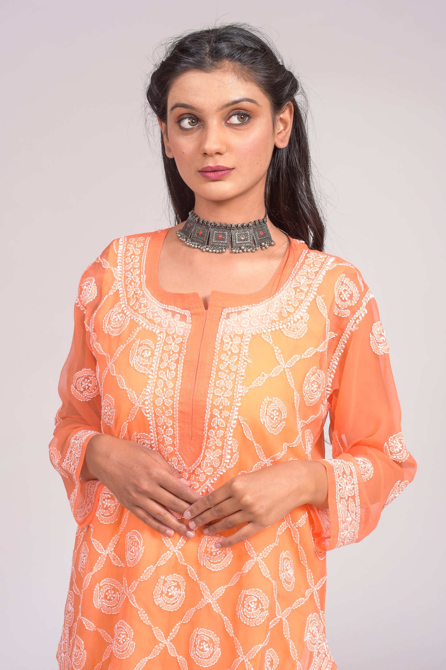 Nice Orange Colour Semi Georgette Chikankari Kurti Lucknow Chikan Emporium.