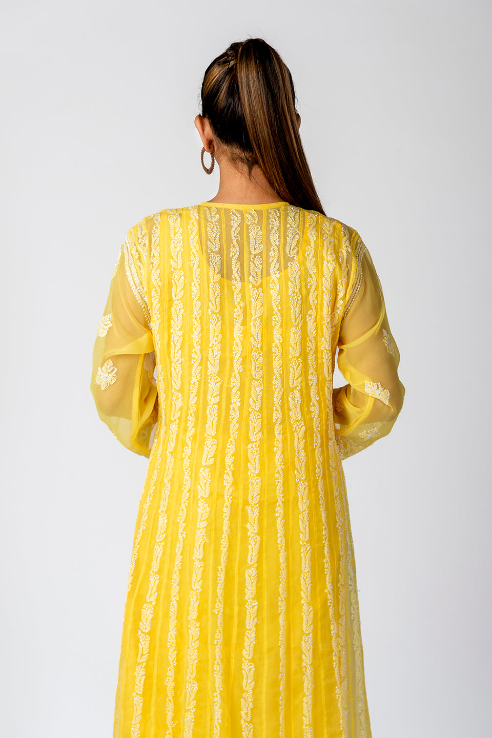Nice Hand Embroided Skin Freindly Georgette Chikankari Yellow Anrkali kurti Lucknow Chikan Emporium.