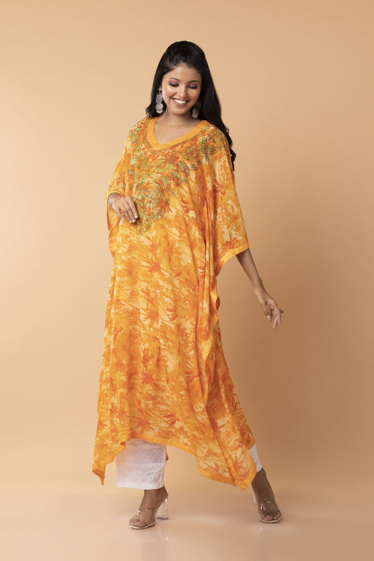 Nice orange /  yellow  colour Kaftan / Gown Hand embroided  skin freindly printed semi georgette Long Kurti Lucknow Chikan Emporium.