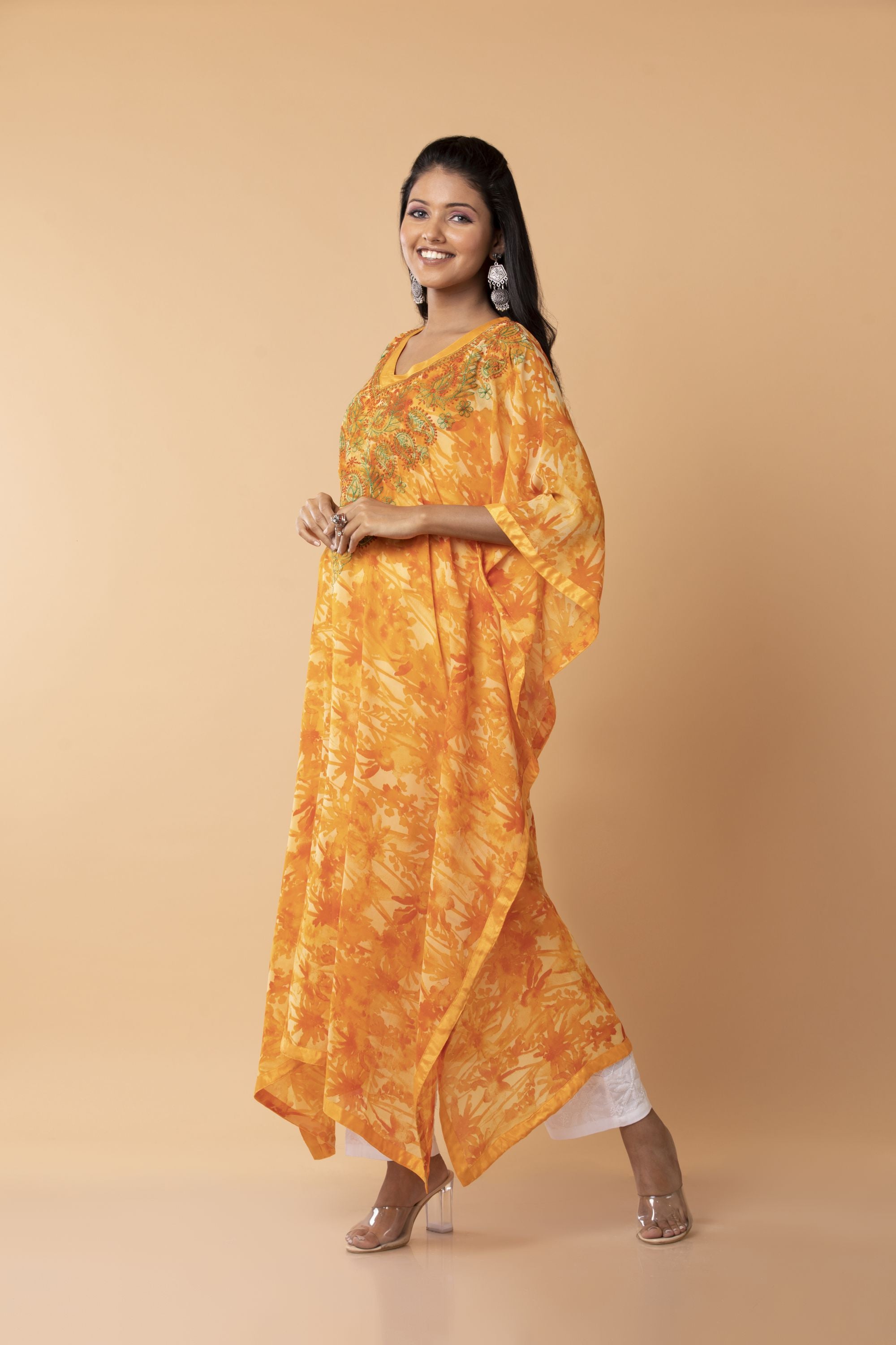 Nice orange /  yellow  colour Kaftan / Gown Hand embroided  skin freindly printed semi georgette Long Kurti Lucknow Chikan Emporium.