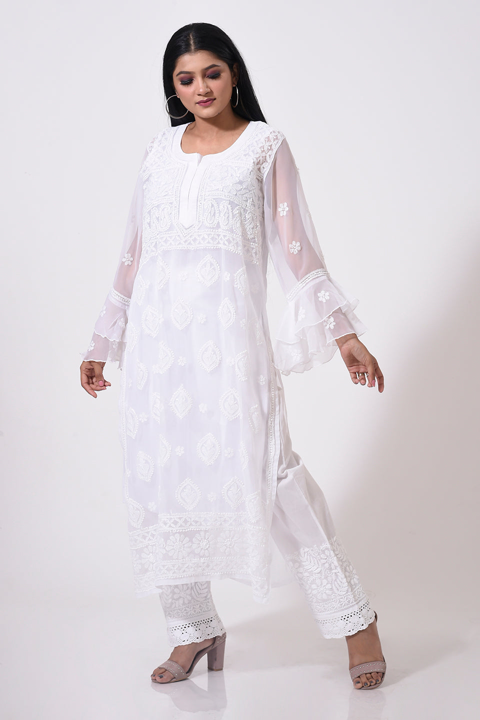 Nice white women Kurti Hand Chikankari Semi Georgette Lucknow Chikan Emporium.