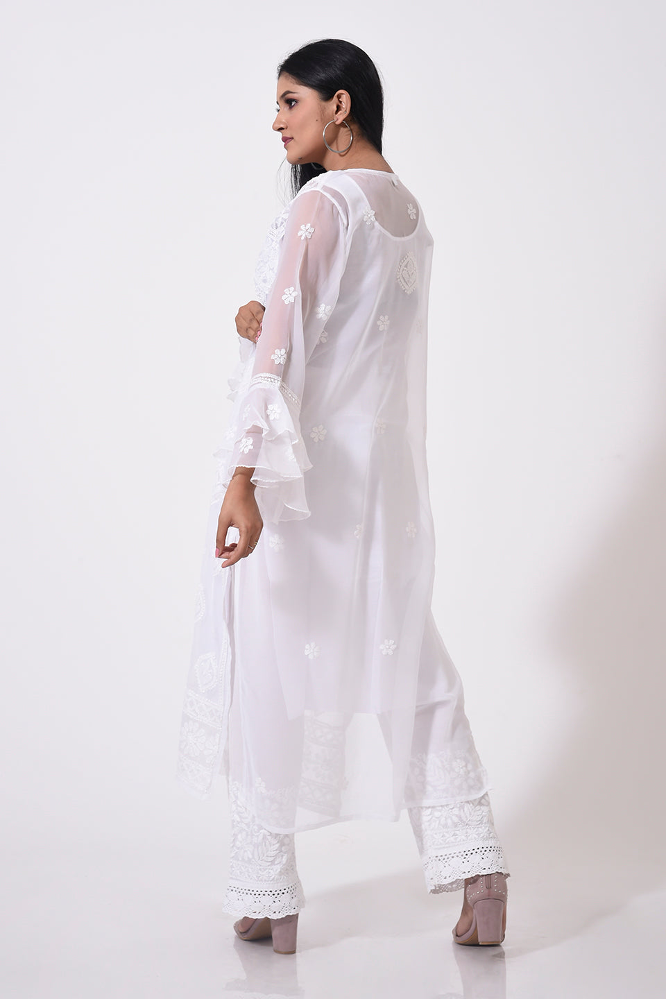 Nice white women Kurti Hand Chikankari Semi Georgette Lucknow Chikan Emporium.