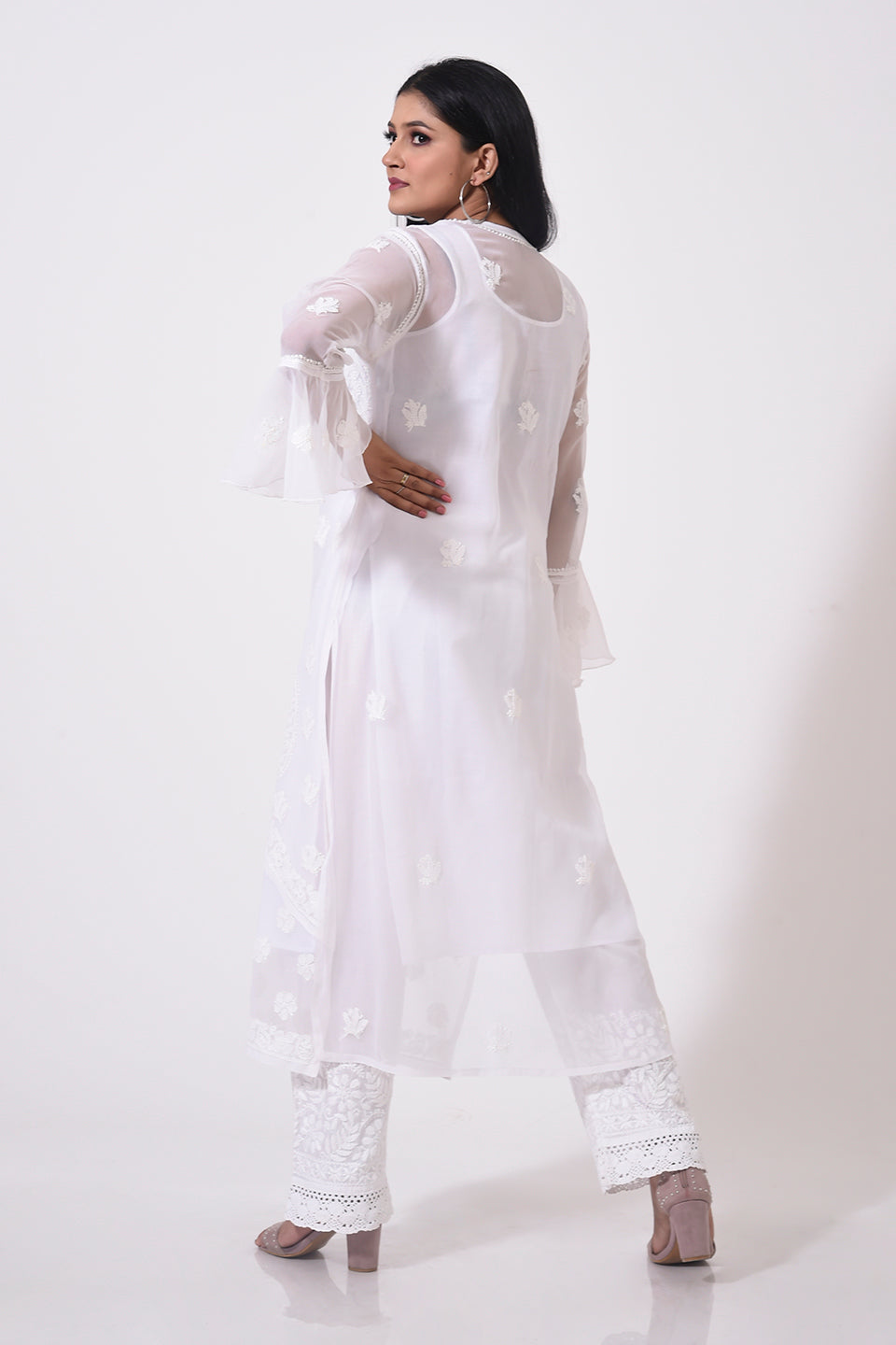 Nice white women Kurti Hand Chikankari Semi Georgette Lucknow Chikan Emporium.