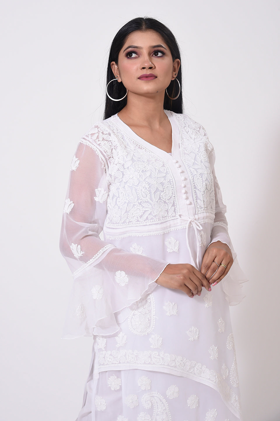 Nice white women Kurti Hand Chikankari Semi Georgette Lucknow Chikan Emporium.