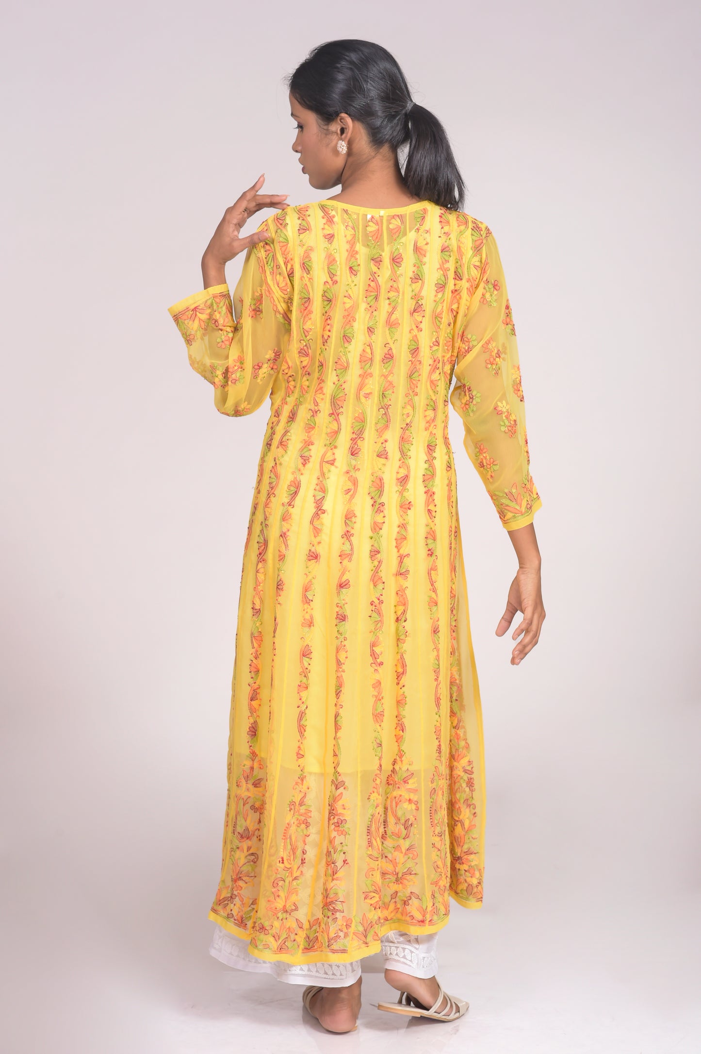 Nice Mustered Yellow Pink Skin Friendly Semi Georgette Hand Chikankari Anarkali Kurti Lucknow Chikan Emporium. No reviews