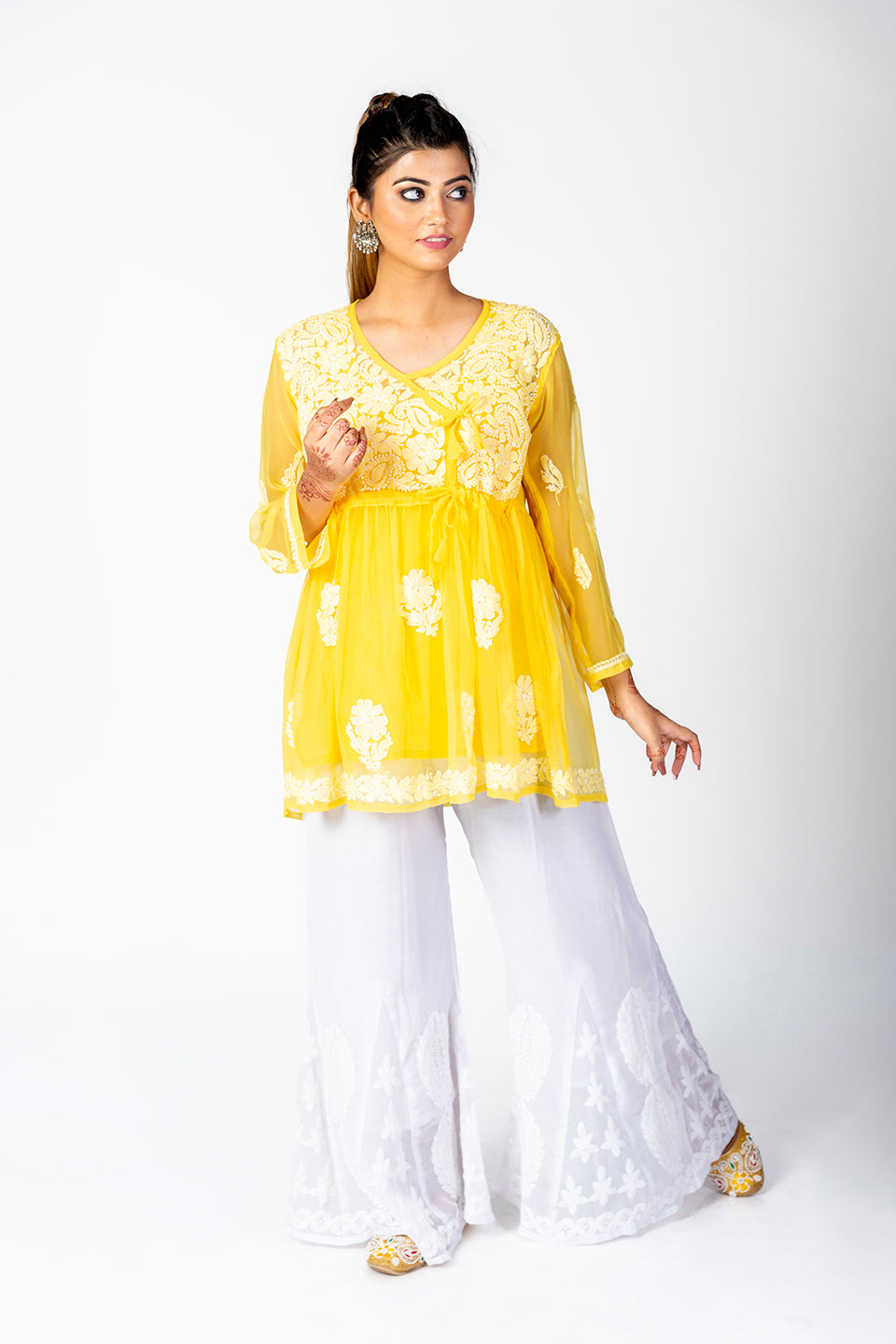 Yellow Skin Friendly Hand Chikankari Short Kurti Lucknow Chikan Emporium.