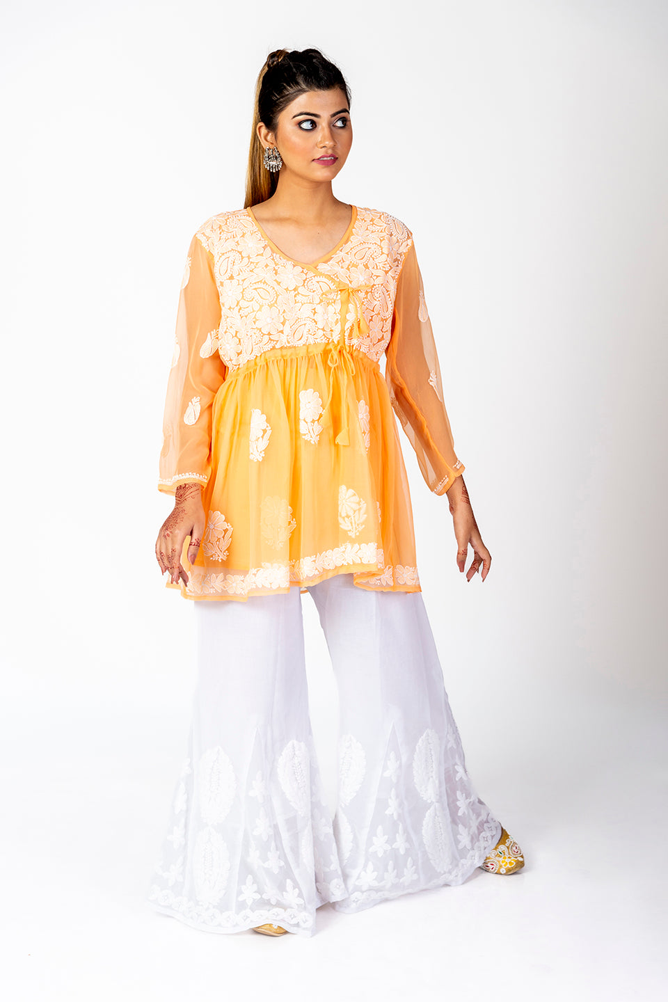 Orange Skin Friendly Hand Chikankari Kurti Lucknow Chikan Emporium.