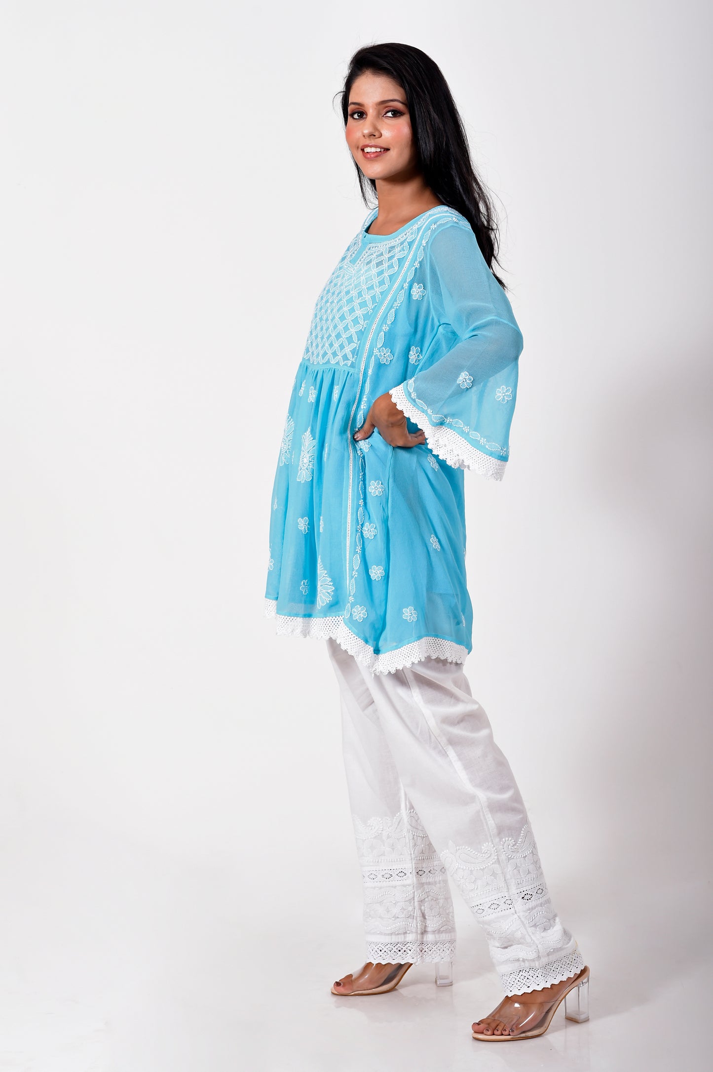 Lucknow Chikan Emporium Hand embroided skin friendly semi georgette Chikankari short Kurti Blue.