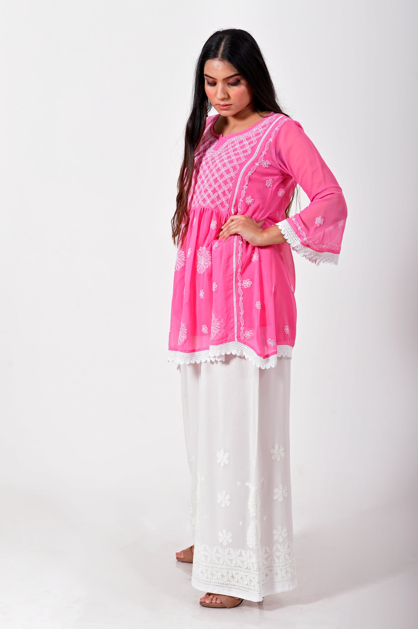 Lucknow Chikan Emporium Hand embroided skin friendly semi georgette Chikankari short Kurti pink.