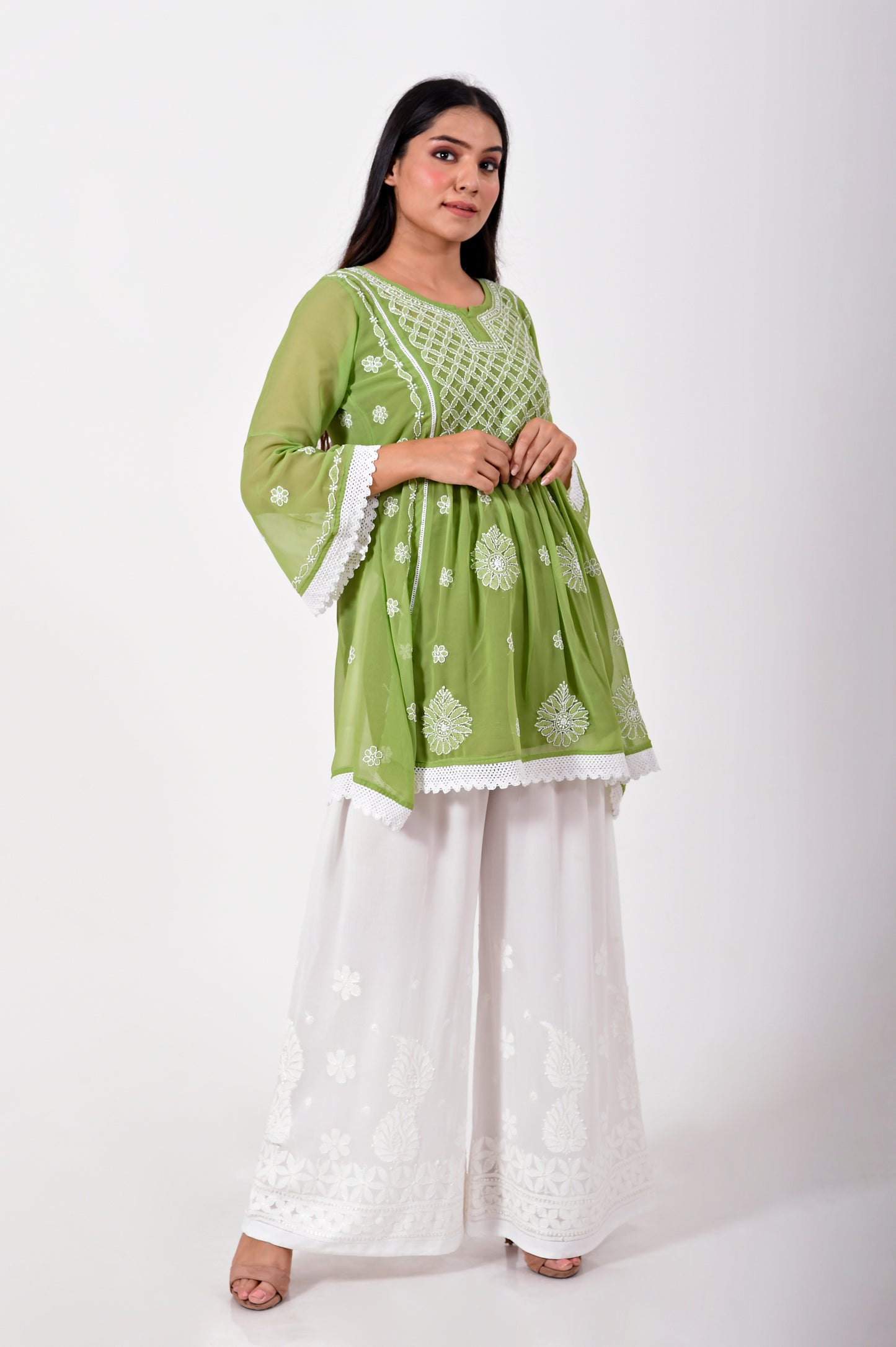 Lucknow Chikan Emporium Hand embroided skin friendly semi georgette Chikankari short Kurti Leaf Green.