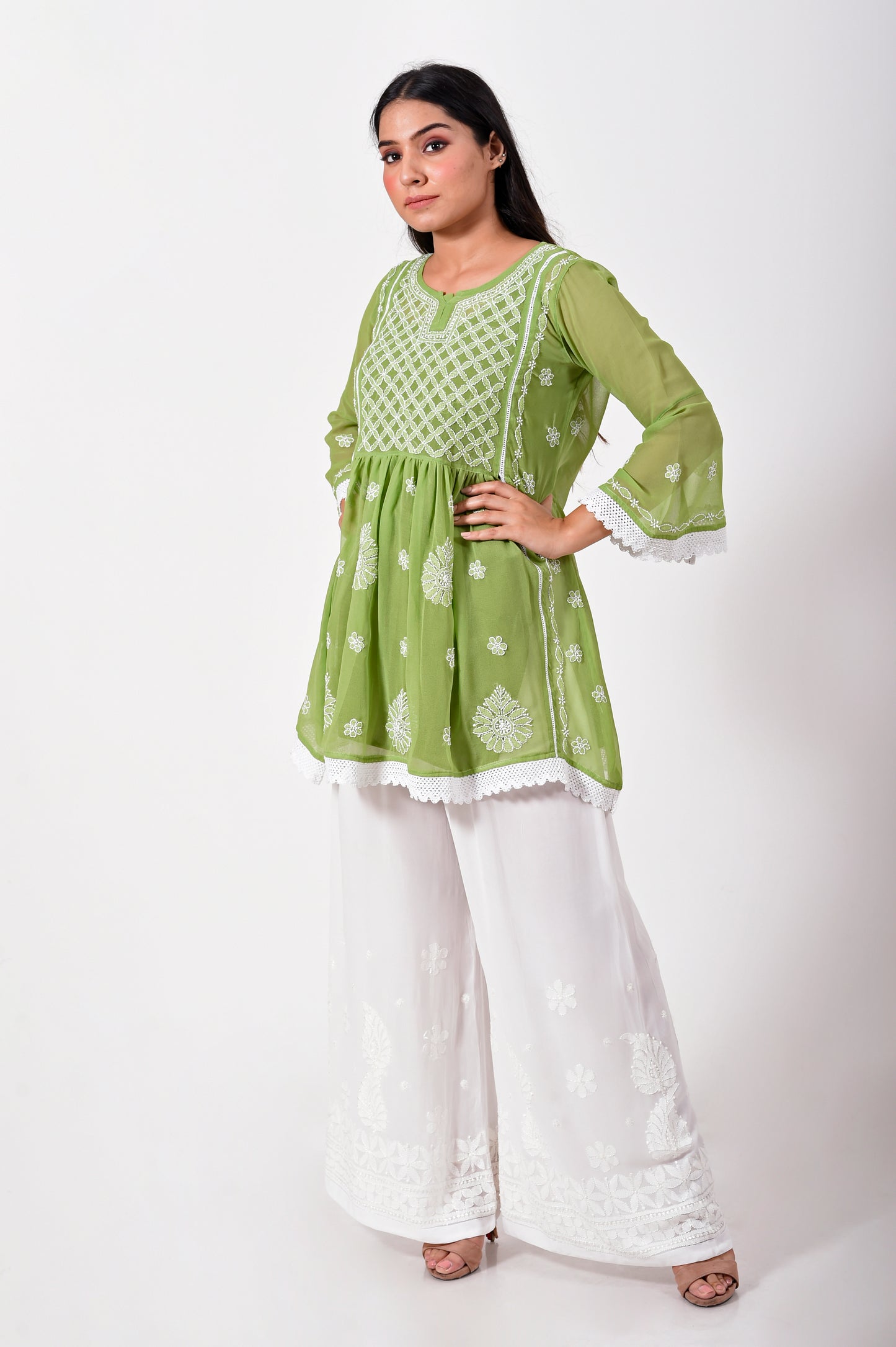 Lucknow Chikan Emporium Hand embroided skin friendly semi georgette Chikankari short Kurti Leaf Green.