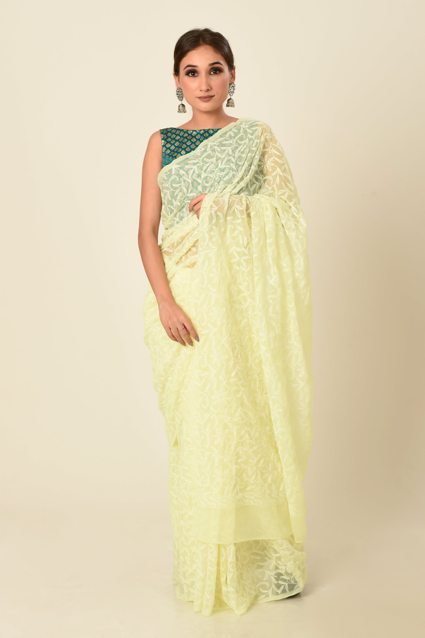 Lucknow Chikan Emporium semi georgette saree lemon yellow colour with same colour blouse