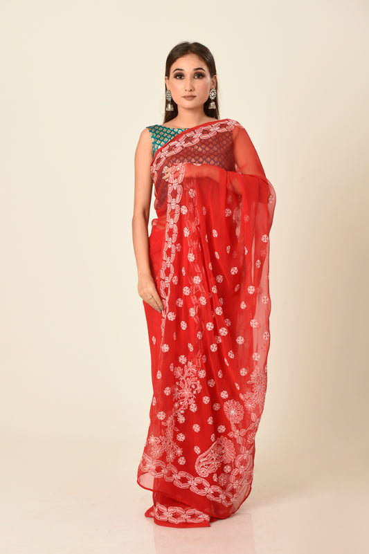 Lucknow Chikan Emporium skin friendly semi georgette red colour with same colour blouse piece included.