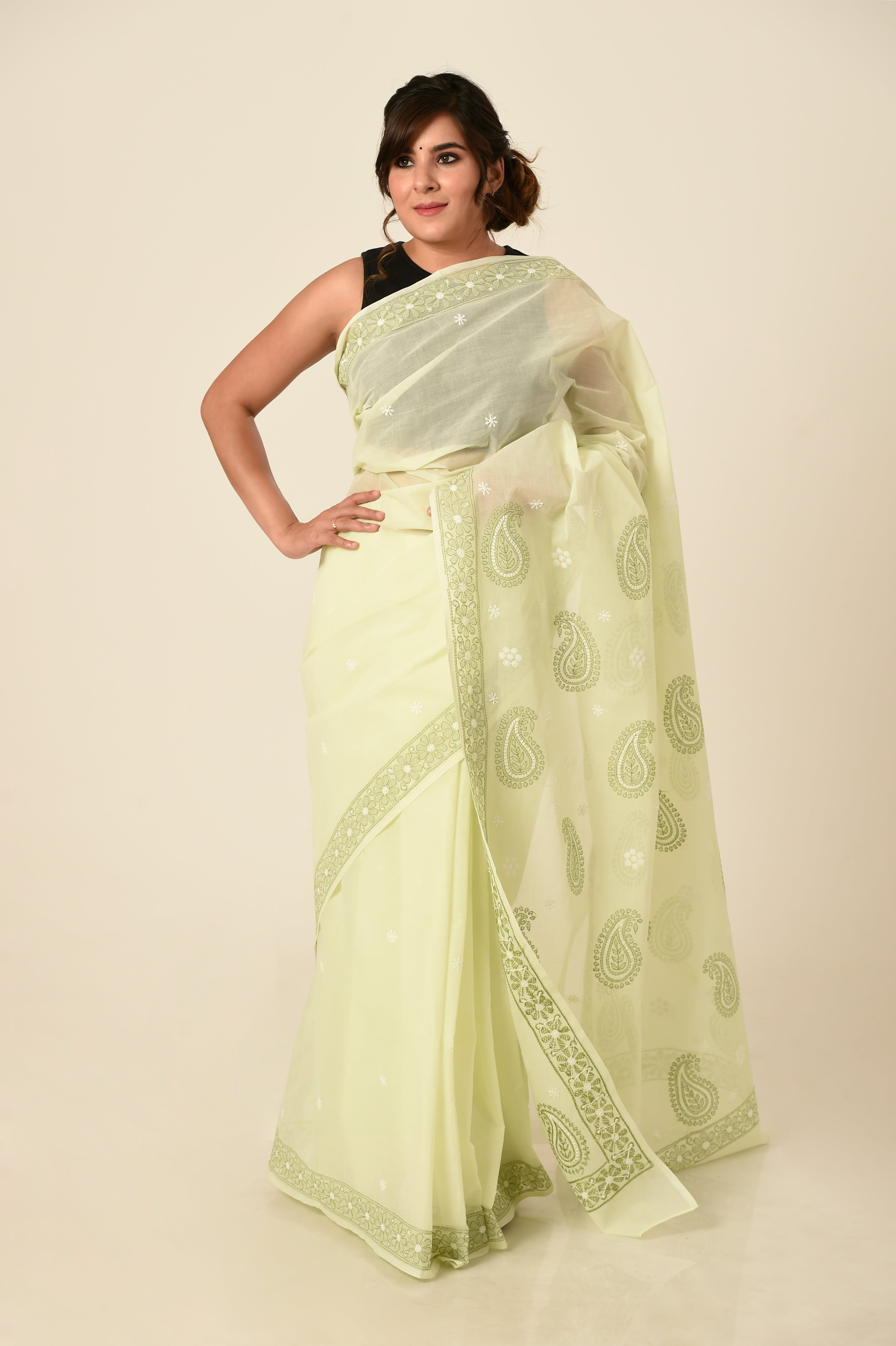 Lucknow Chikan Emporium Cotton Saree Light Green Colour with same colour blouse piece included.