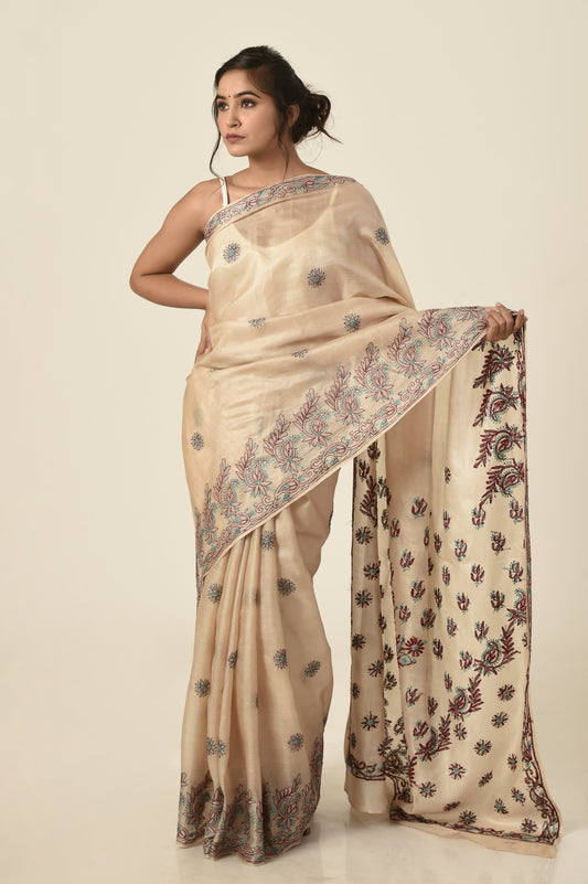 Lucknow Chikan Emporium tussar silk saree beige colour with same colour blouse piece included.