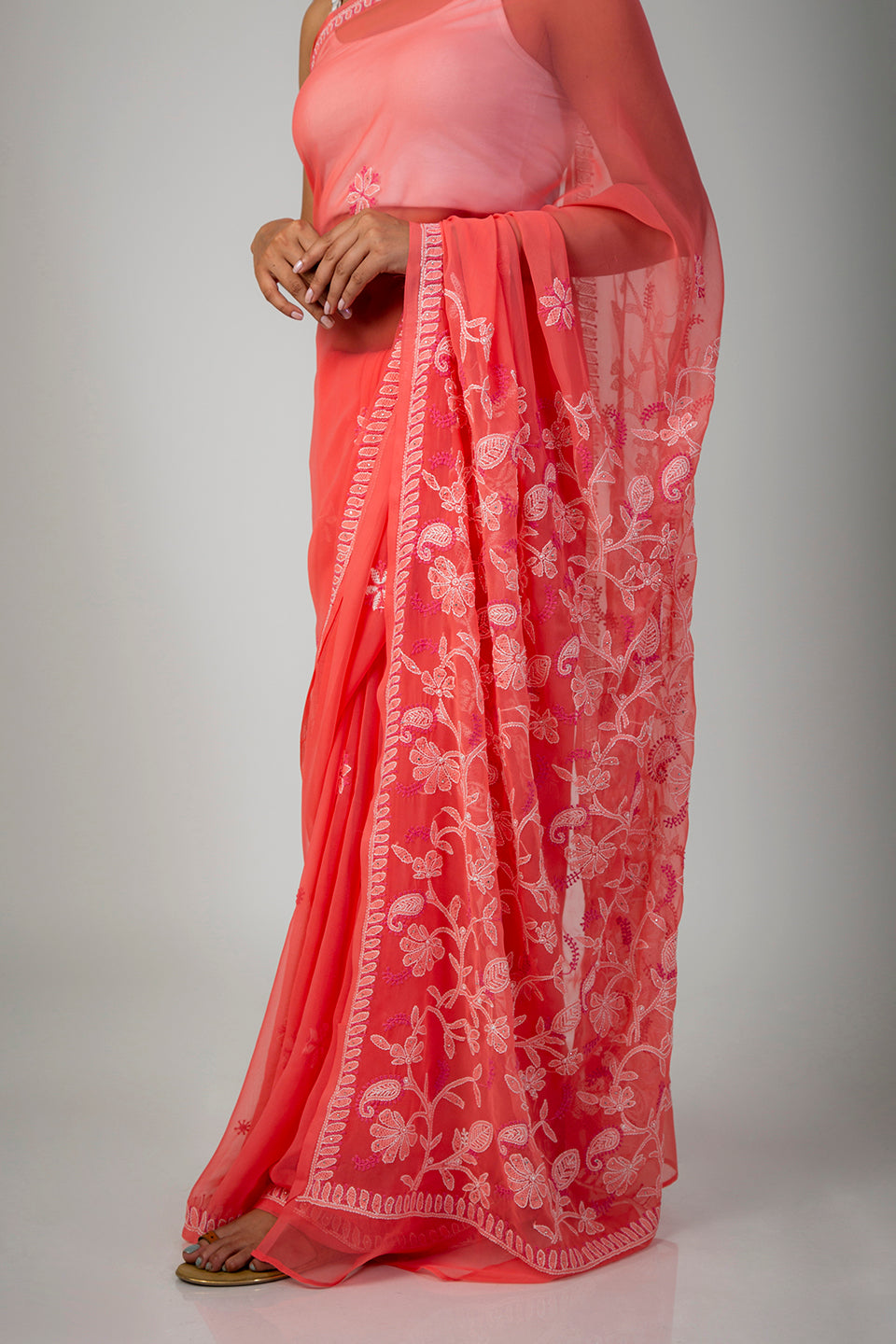 Lucknow Chikan Emporium Semi Georgette Peach saree with blouse piece included and Lucknowi Mukaish Work