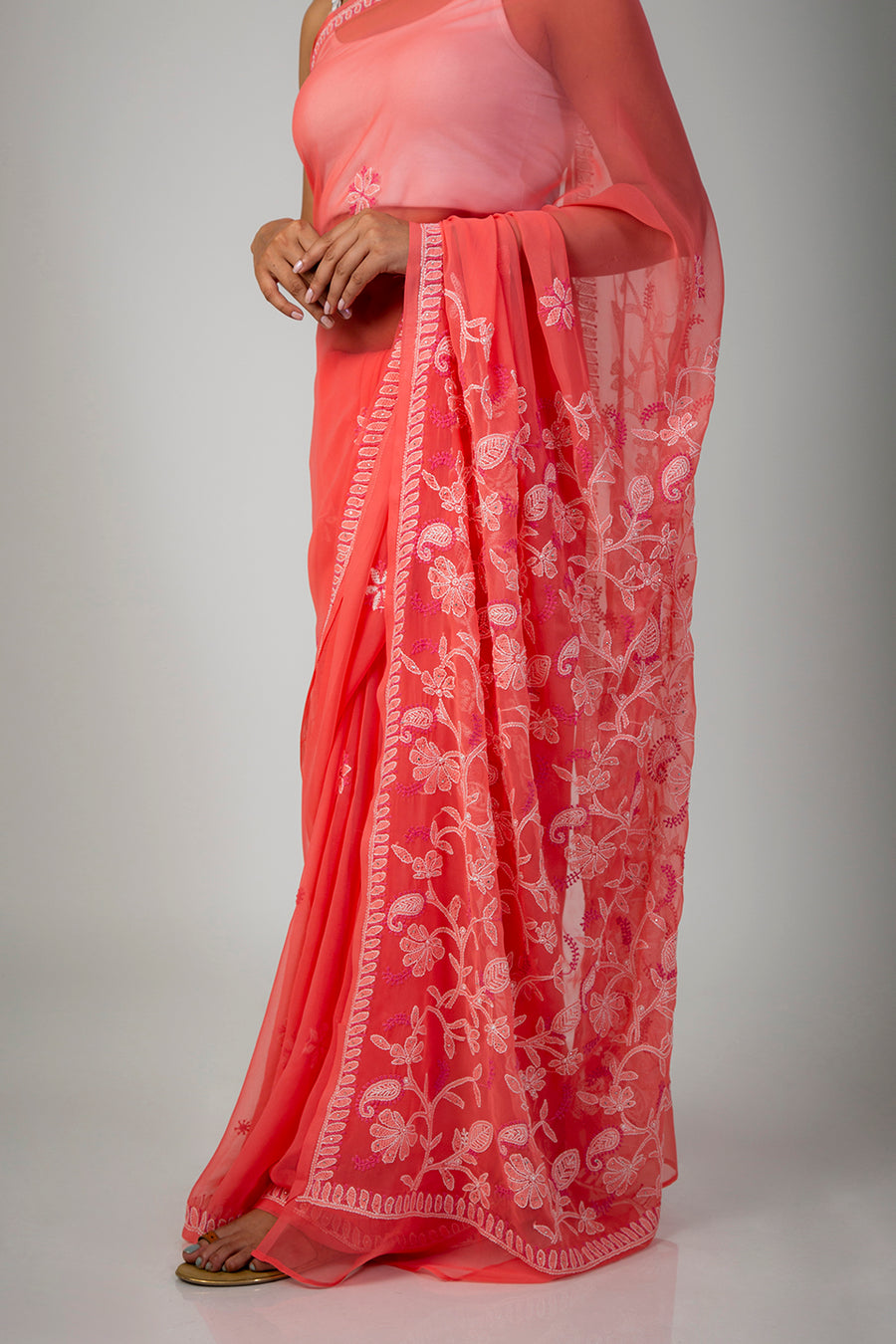 Lucknow Chikan Emporium Semi Georgette Peach saree with blouse piece included and Lucknowi Mukaish Work