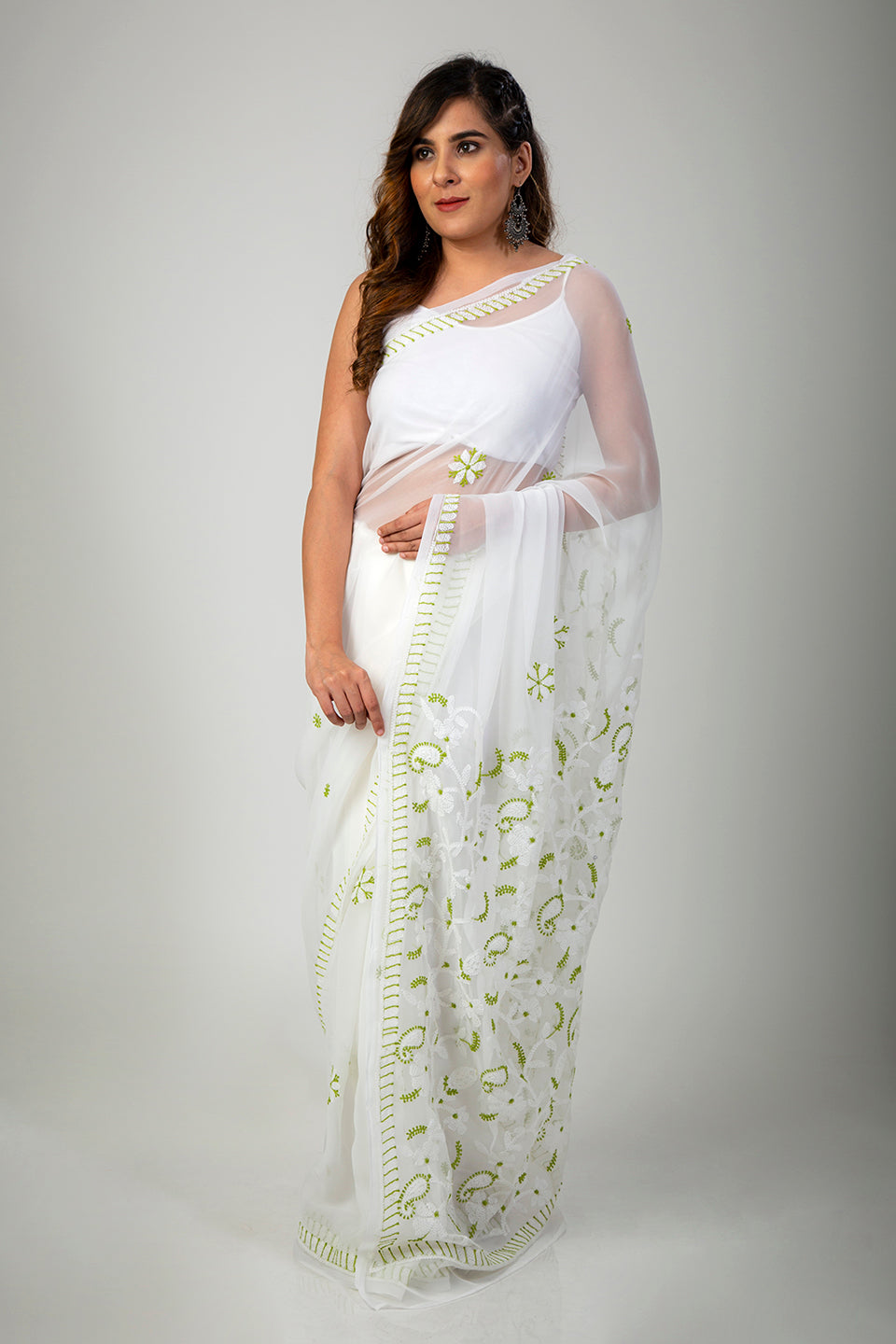 Lucknow Chikan Emporium Semi Georgette white saree with blouse piece included.