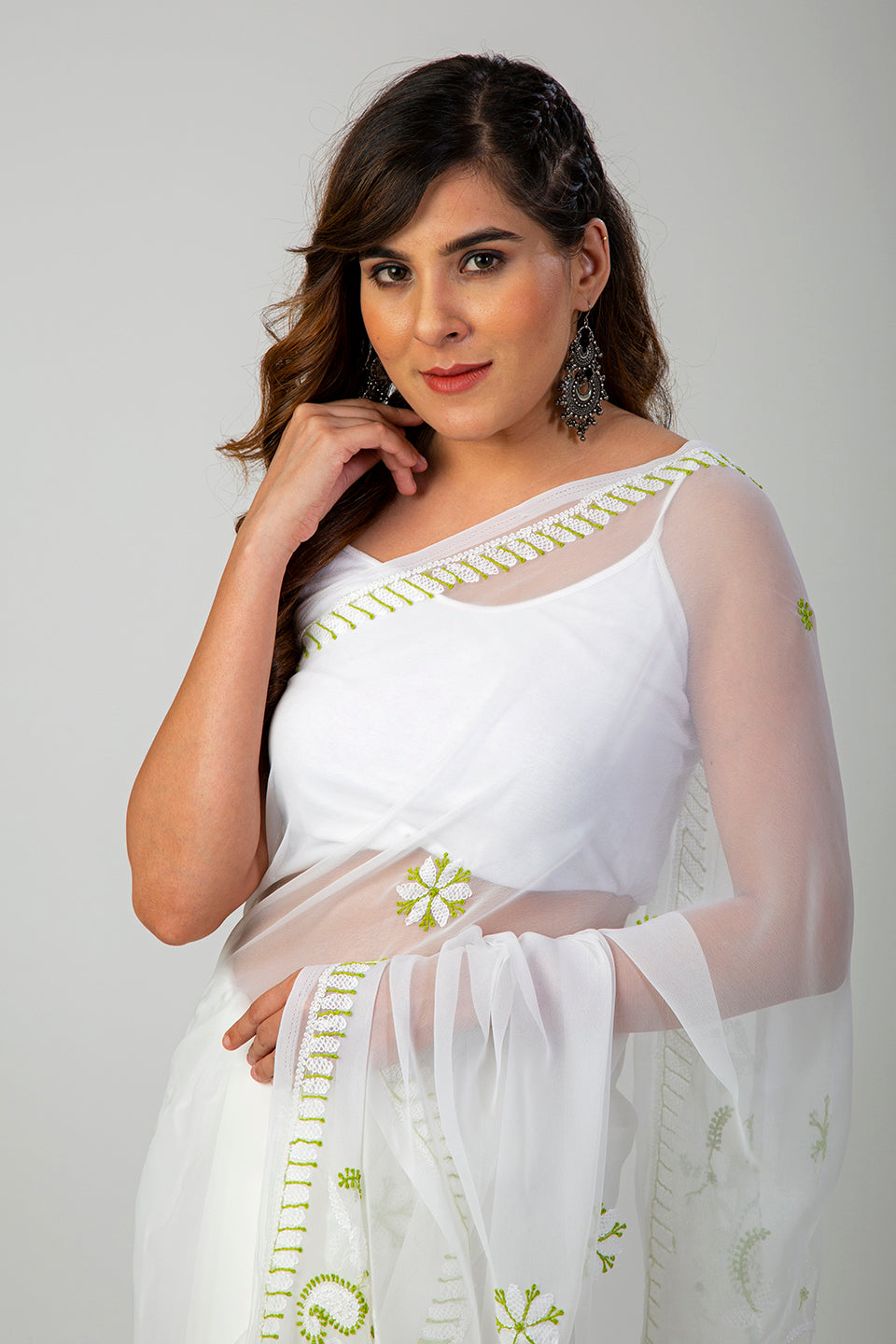 Lucknow Chikan Emporium Semi Georgette white saree with blouse piece included.