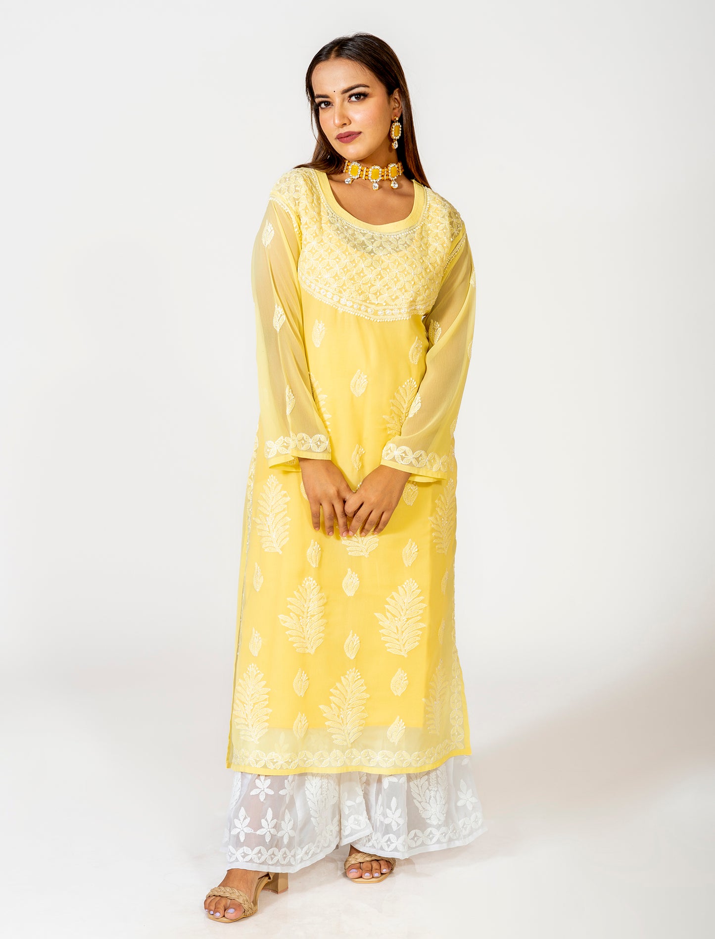 Yellow Hand Embroided Skin Friendly Semi Georgette Chikankari Kurti Lucknow Chikan Emporium.