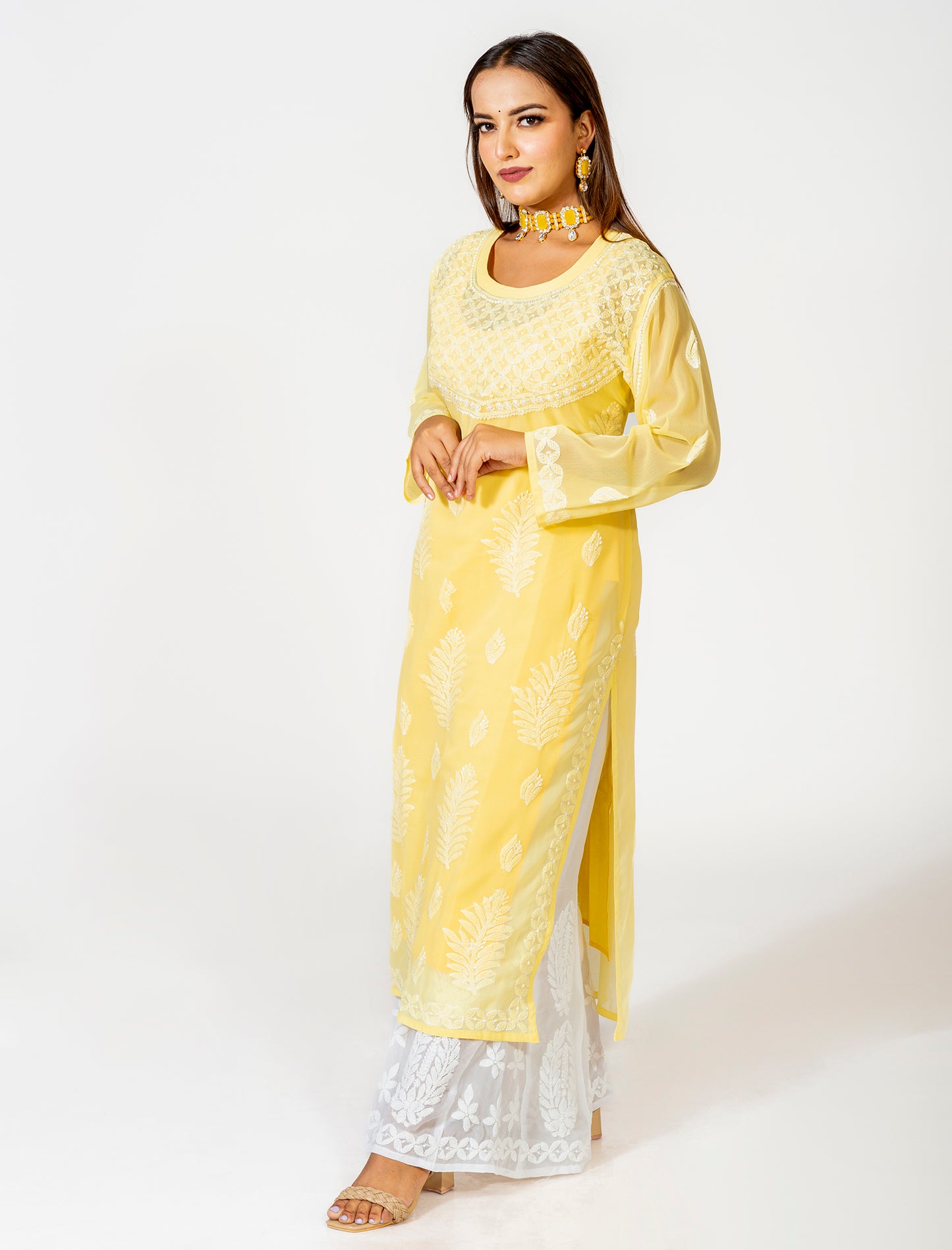 Yellow Hand Embroided Skin Friendly Semi Georgette Chikankari Kurti Lucknow Chikan Emporium.
